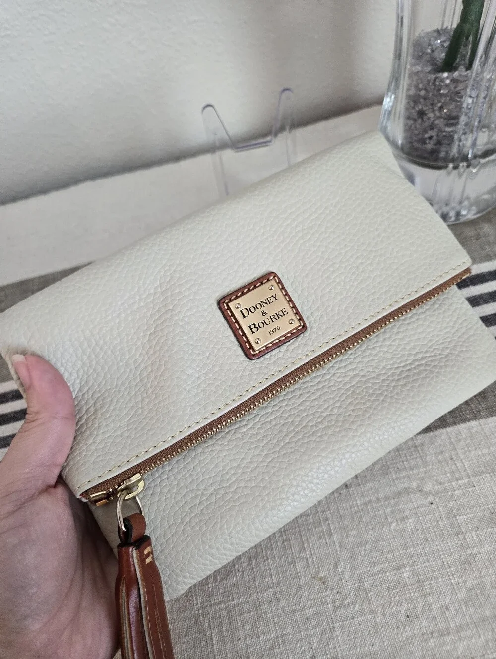 Dooney & Bourke Ivory Fold-Over Pebble Leather Clutch